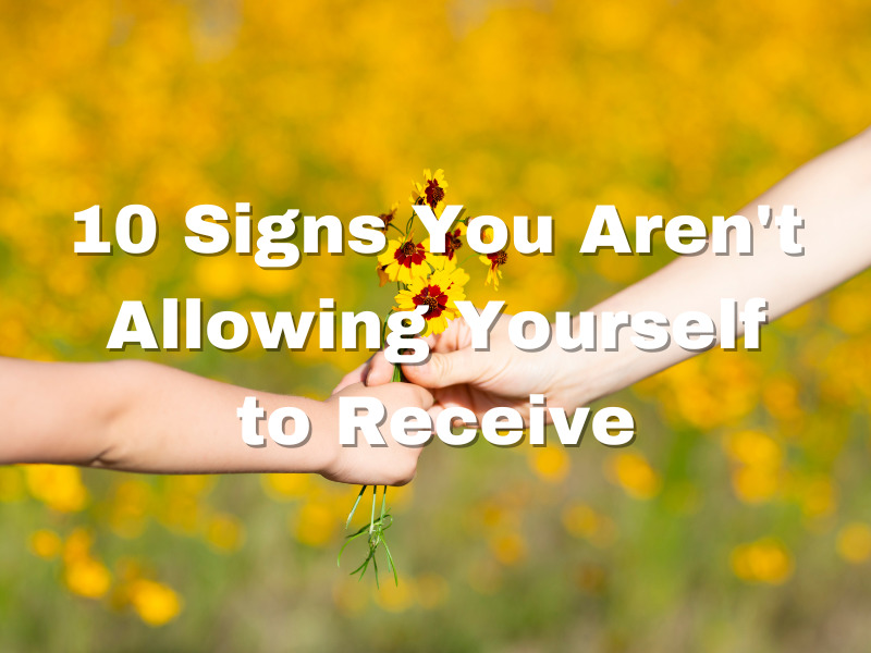10 Signs You Aren't Allowing Yourself to Receive Blog Post with picture of a child handing a bunch of yellow daisys to a woman in a field of daisies