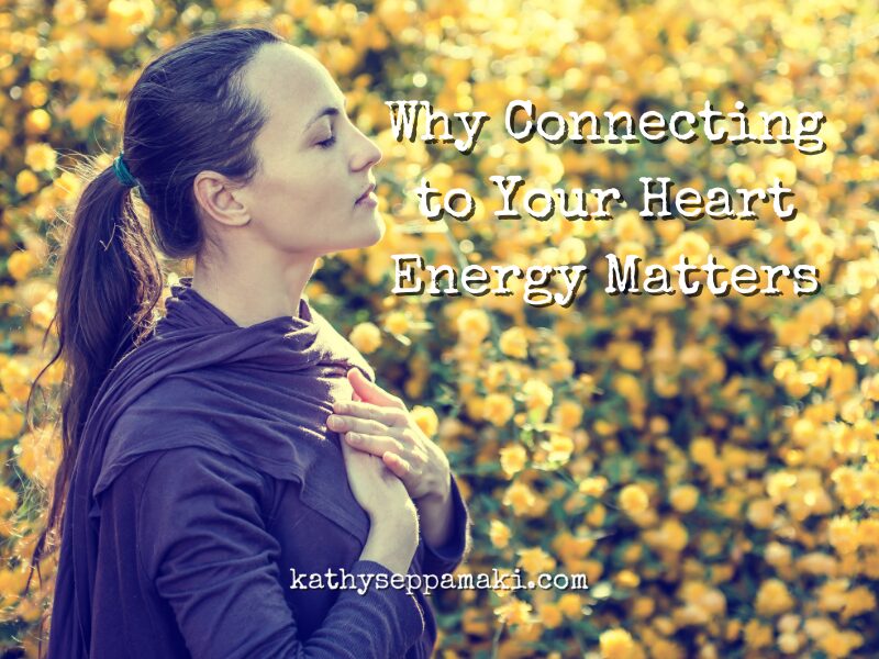 Why Connecting to Your Heart Energy Matters Blog Post- Picture of a woman holding both hands over her heart