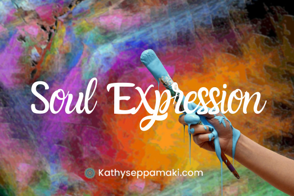 Soul Expression Blog Post title with picture of a hand holding a paintbrush and covered with paint