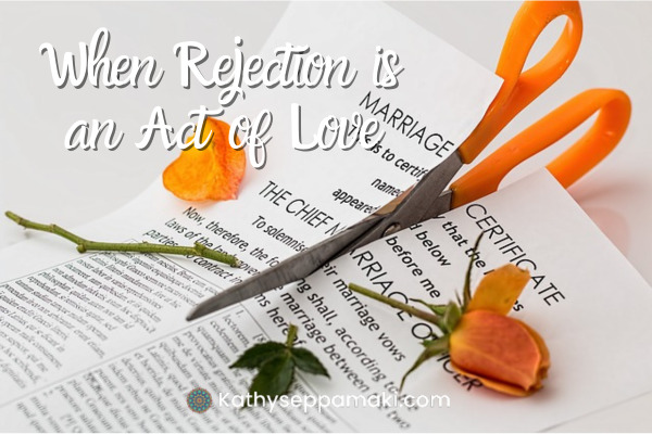 When Rejection Is An Act of Love Blog Post Title with picture of a marriage certificate being cut with scissors