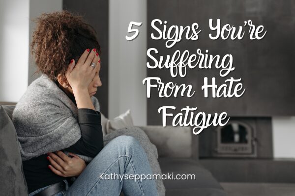 5 Signs You're Suffering from Hate Fatigue blog post with picture of woman sitting on a couch with her hands over her face looking distressed