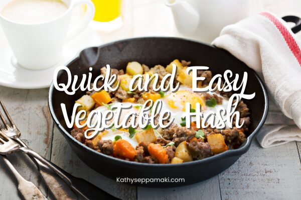 Quick and easy vegetable hash blog post title with a cast iron pan sitting on a tabletop filled with hash