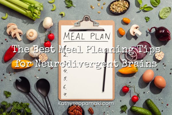 The Best Meal Planning Tips for Neurodivergent Brains blog post title with a picture of a clipboard holding a meal planning list. The clipboard is surrounded by all kinds of different foods and cooking utinsels